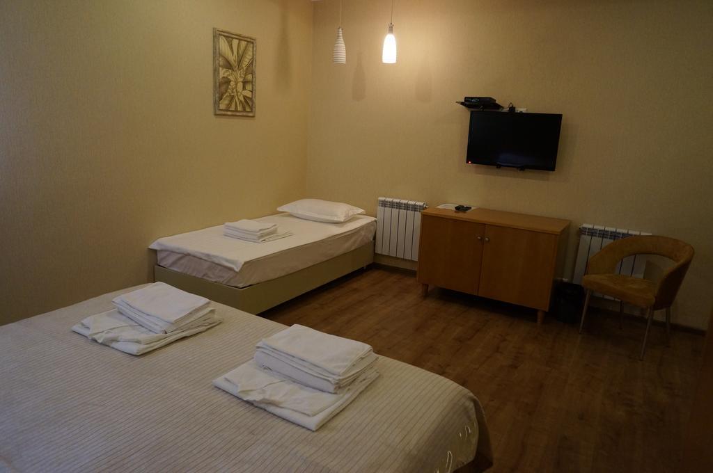 ホテル Grushevy Hospitality Boutique アルマトイ 部屋 写真