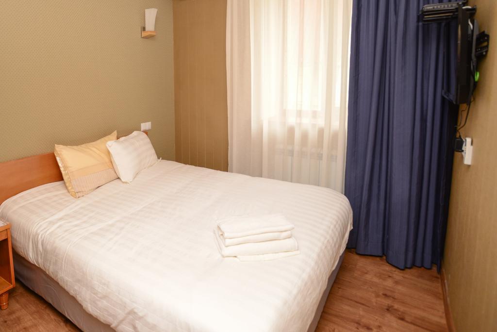 ホテル Grushevy Hospitality Boutique アルマトイ 部屋 写真
