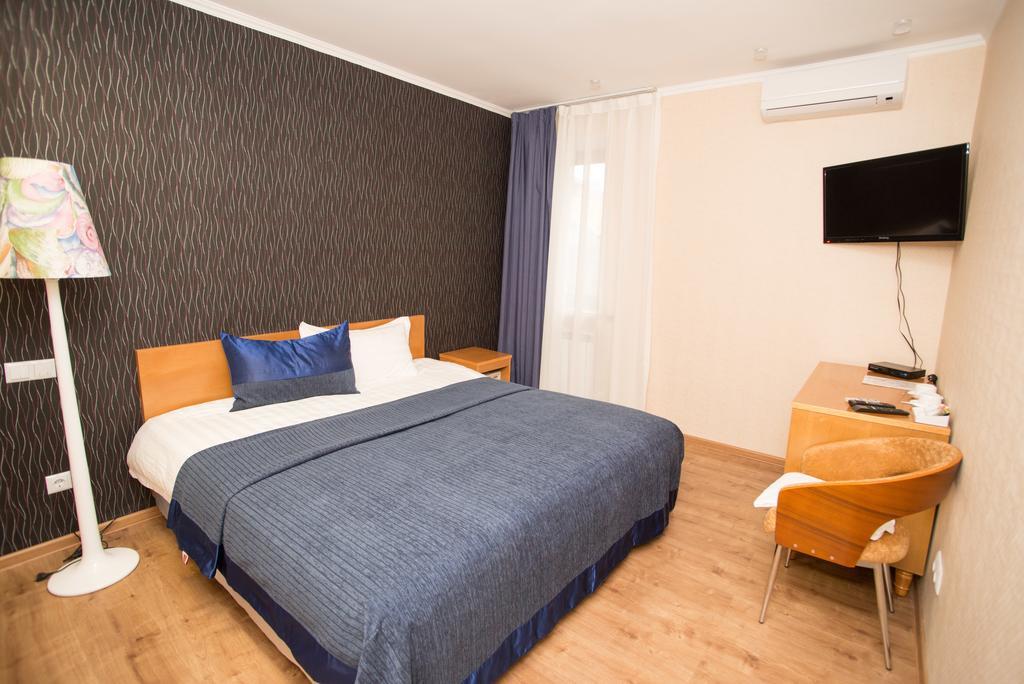 ホテル Grushevy Hospitality Boutique アルマトイ 部屋 写真