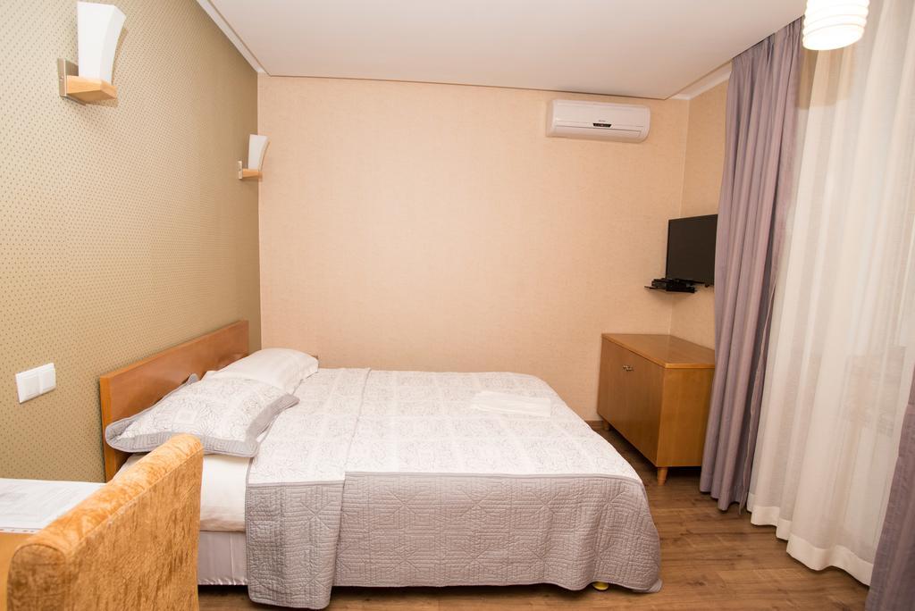 ホテル Grushevy Hospitality Boutique アルマトイ 部屋 写真