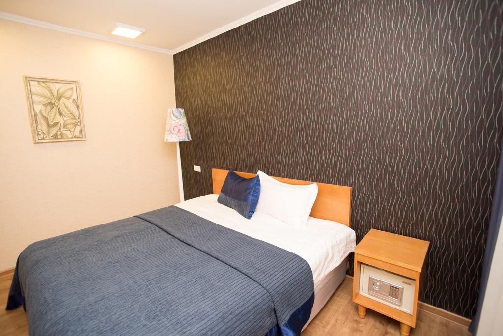 ホテル Grushevy Hospitality Boutique アルマトイ 部屋 写真