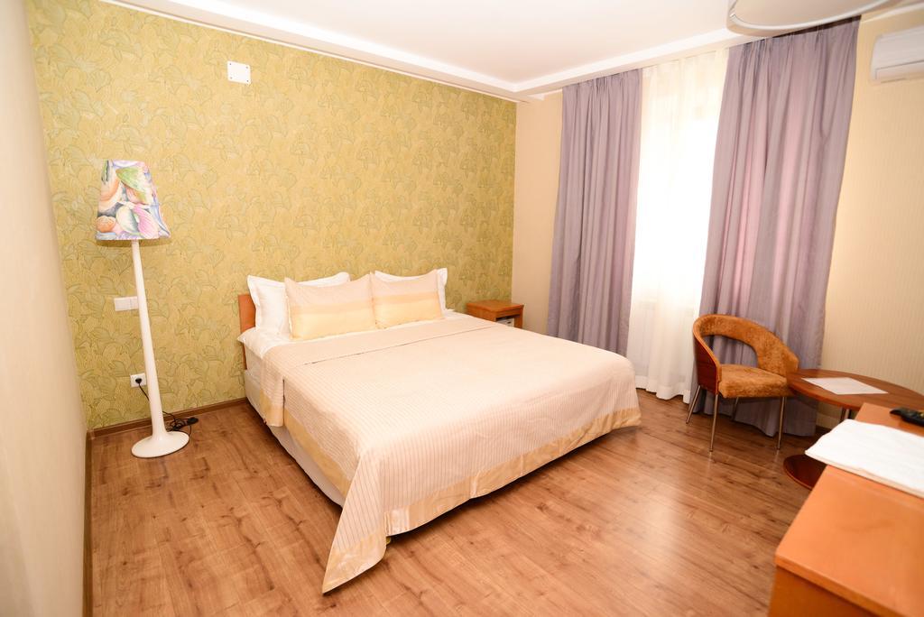 ホテル Grushevy Hospitality Boutique アルマトイ 部屋 写真